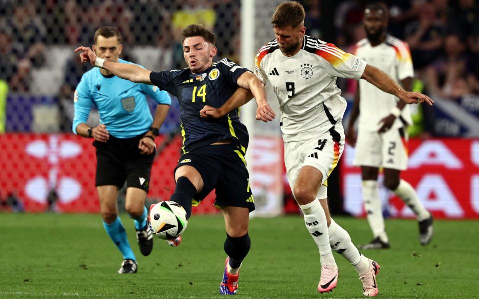 Billy Gilmour of Scotland (L) in action against Niclas Fuellkrug of Germany