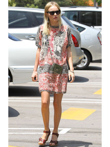 <div class="caption-credit"> Photo by: Splash News</div><div class="caption-title">Kate Bosworth</div>This funky print gives a little edge to a easy-to-wear dress. Add in a pair of Wayfarers and a little silver bag and you've got the definition of downtown cool. <br>