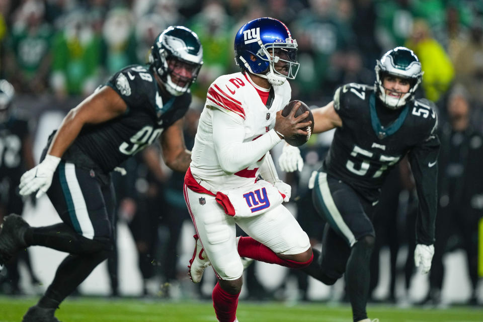 New York Giants quarterback Tyrod Taylor looks to pass against the Philadelphia Eagles during the second half of an NFL football game Monday, Dec. 25, 2023, in Philadelphia. (AP Photo/Matt Rourke)