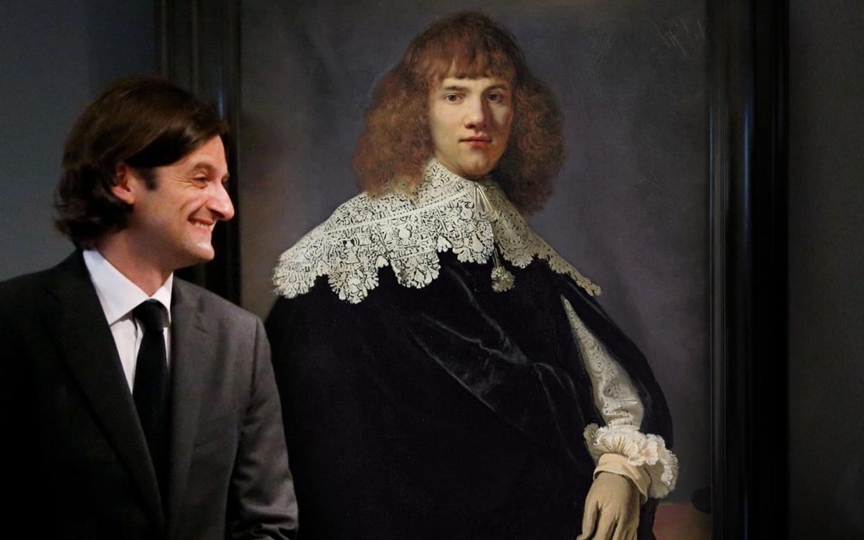 Dutch art dealer Jan Six, with Rembrandt's Portrait of a Young Man - Reuters/Screenocean