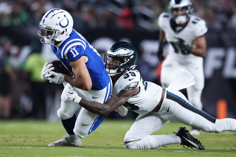 Indianapolis Colts wide receiver Michael Pittman Jr. (11) is tackled by Philadelphia Eagles cornerback Eli Ricks (39) after a catch during the first half of an NFL preseason football game Thursday, Aug. 24, 2023, in Philadelphia. (AP Photo/Matt Slocum)