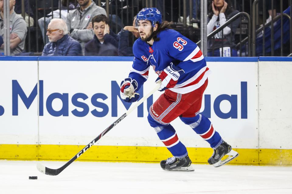 Apr 21, 2024; New York, New York, USA; New York Rangers center Mika Zibanejad (93) controls the puck against the Washington Capitals in game one of the first round of the 2024 Stanley Cup Playoffs at Madison Square Garden.