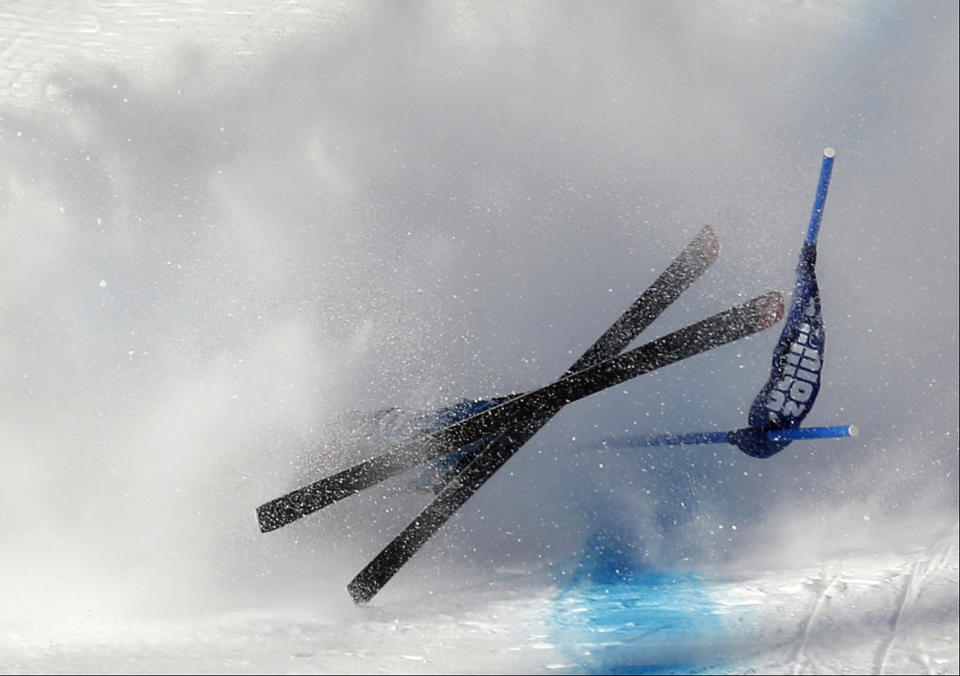 Switzerland's Nadja Jnglin-Kamer crashes near the finish line during a women's downhill training run for the Sochi 2014 Winter Olympics, Saturday, Feb. 8, 2014, in Krasnaya Polyana, Russia.(AP Photo/Christophe Ena)