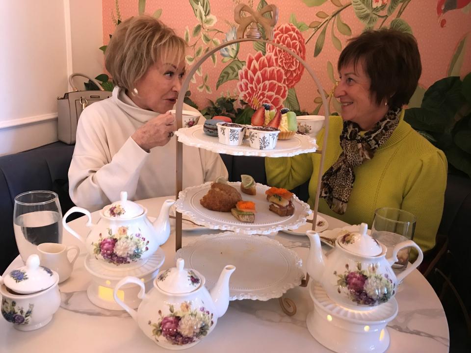 Lisa Otremsky of Haddon Township, seated to the right, celebrates her birthday with  sister Mary Ann Fischer of Medford, with afternoon tea at newly opened Prince Tea House in Marlton on March 8, 2023