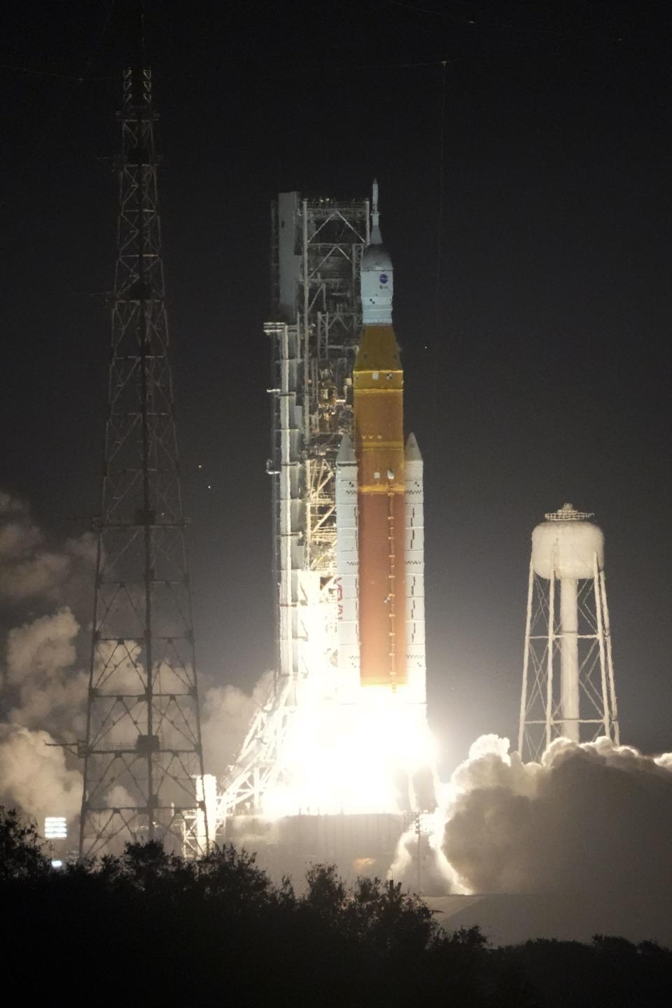 NASA's new moon rocket lifts off from Launch Pad 39B at the Kennedy Space Center in Cape Canaveral, Fla., Wednesday, Nov. 16, 2022. This launch is the first flight test of the Artemis program. (AP Photo/John Raoux)