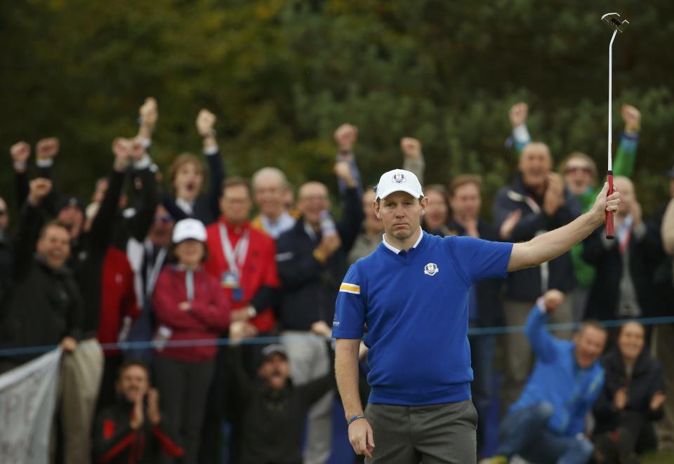 European Ryder Cup player Stephen Gallacher celebrates his putt to win the tenth hole during the 40th Ryder Cup singles matches at Gleneagles in Scotland September 28, 2014. REUTERS/Phil Noble (BRITAIN - Tags: SPORT GOLF)