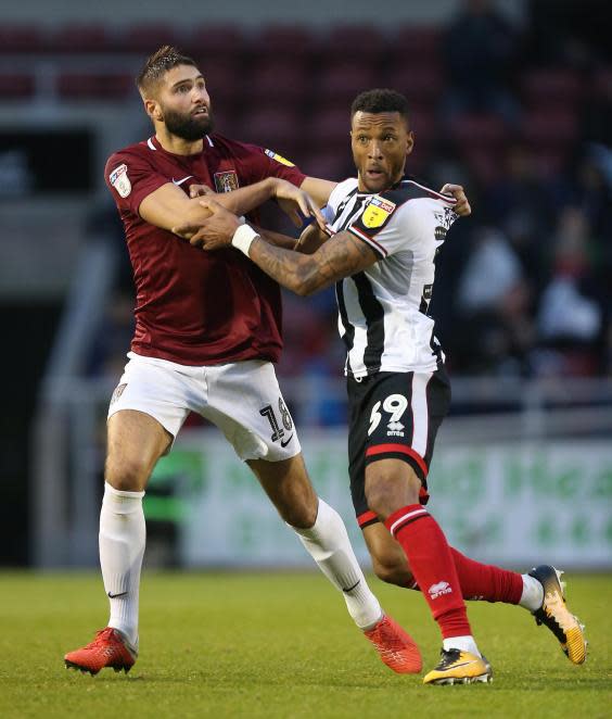 Jolley's unusual journey has led him to the rough and tumble of League Two with Grimsby Town (Getty)