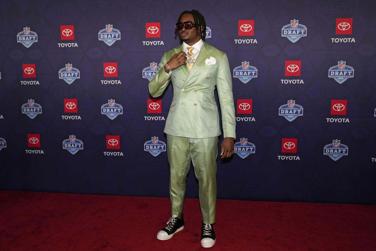 Alabama edge rusher Dallas Turner poses on the red carpet ahead of the first round of the NFL football draft, Thursday, April 25, 2024, in Detroit. (AP Photo/Carlos Osorio)