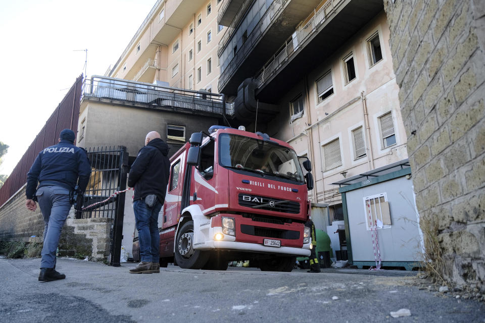 Emergency services attend the scene after a fire at the San Giovanni Evangelista Hospital in Tivoli, Italy Saturday Dec. 9, 2023. The fire broke out in a hospital on Rome's outskirts, killing at least three people and forcing the overnight evacuation of the smoke-filled facility and its patients, officials said Saturday. (Mauro Scrobogna/LaPresse via AP)