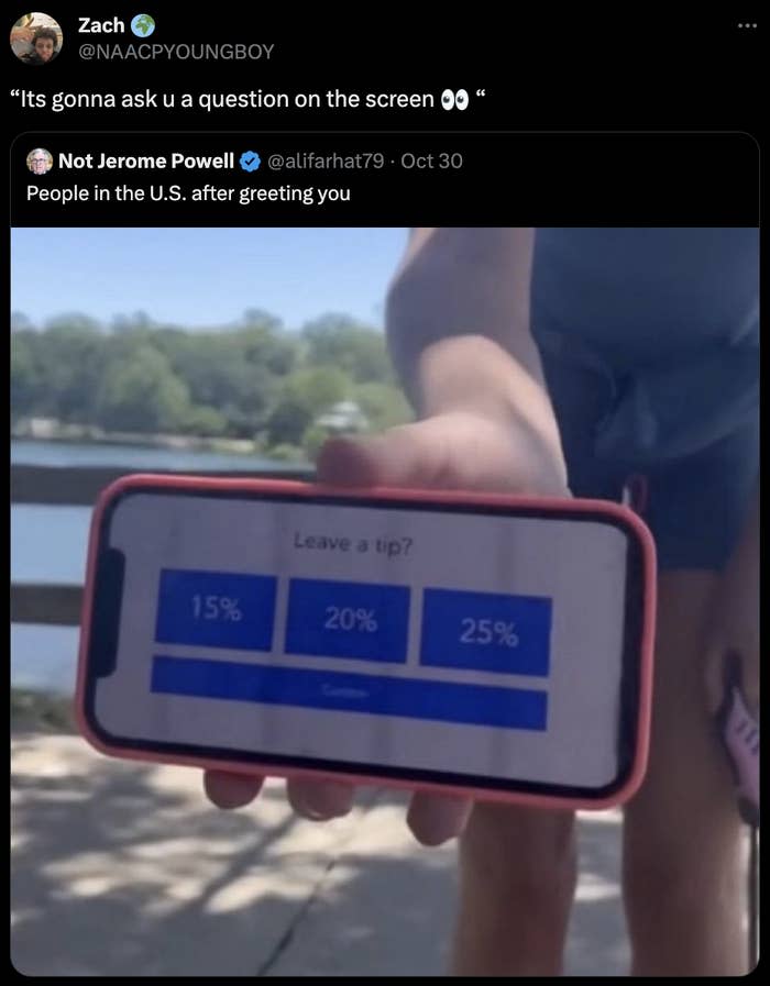 person showing a tipping screen on their phone