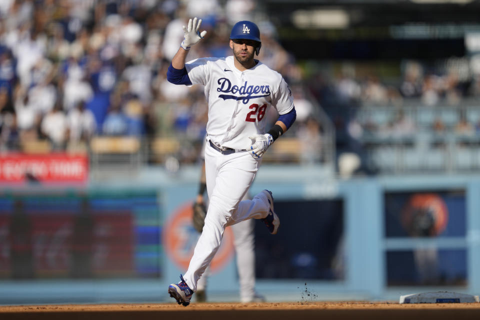 Los Angeles Dodgers designated hitter J.D. Martinez (28) celebrates after hitting a home run during the seventh inning of a baseball game against the New York Yankees in Los Angeles, Sunday, June 4, 2023. (AP Photo/Ashley Landis)