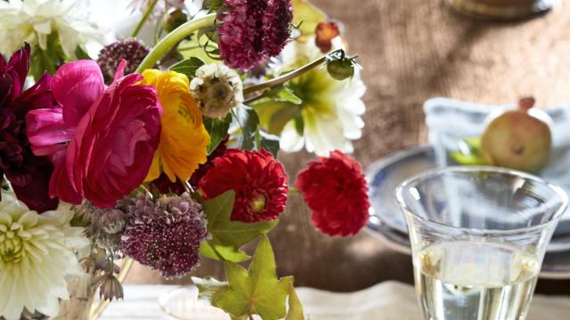 Grasses and Feathers Faux Floral Design With Burgundy Hydrangeas in Bamboo  Motif Vase 