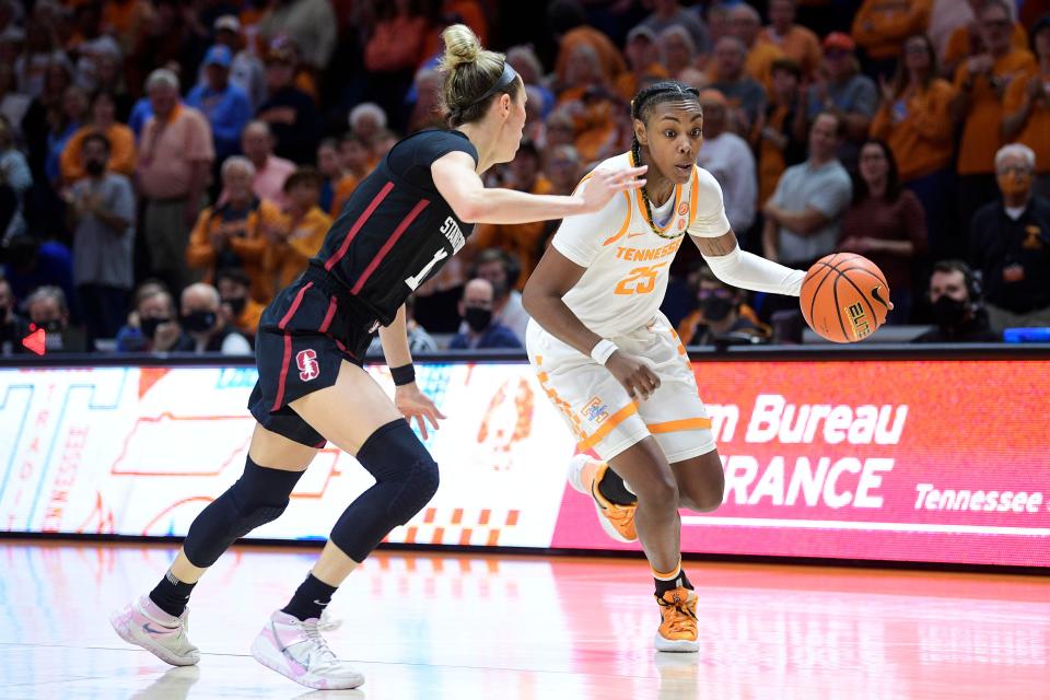 Tennessee guard Jordan Horston (25) dribbles as Stanford guard Lexie Hull (12) defends during a game between Tennessee and Stanford at Thompson-Boling Arena in Knoxville, Tenn. on Saturday, Dec. 18, 2021.