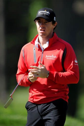 Rory McIlroy of Northern Ireland reacts to his putt during a practice round prior to the start of the 112th U.S. Open at The Olympic Club on June 12, 2012 in Daly City, California