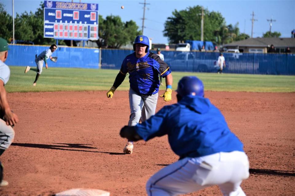 Dos Palos High School senior Will Montemurro races to third base after hitting a triple in the sixth inning. Montemurro would score the go-ahead run during the Broncos’ 4-3 victory over Dinuba in the Central Section Division III semifinal game on Tuesday, May 23, 2023 at Dos Palos High School.