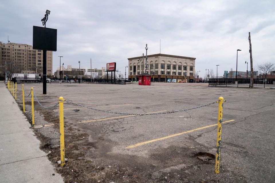 A downtown parking on West Adams between Clifford Street and Cass Avenue on March 30, 2022, had attendants charging parkers only to have the parkers discover tickets on their windshields after a recent event.