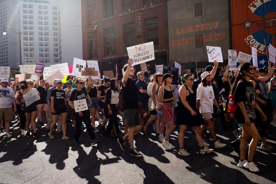 June 24, 2022: Abortion rights demonstrators march through the streets to protest the Supreme Court's decision in the Dobbs v Jackson Women's Health case in Detroit, Michigan. The Court's decision in the Dobbs v Jackson Women's Health case overturns the landmark 50-year-old Roe v Wade case, removing a federal right to an abortion. 