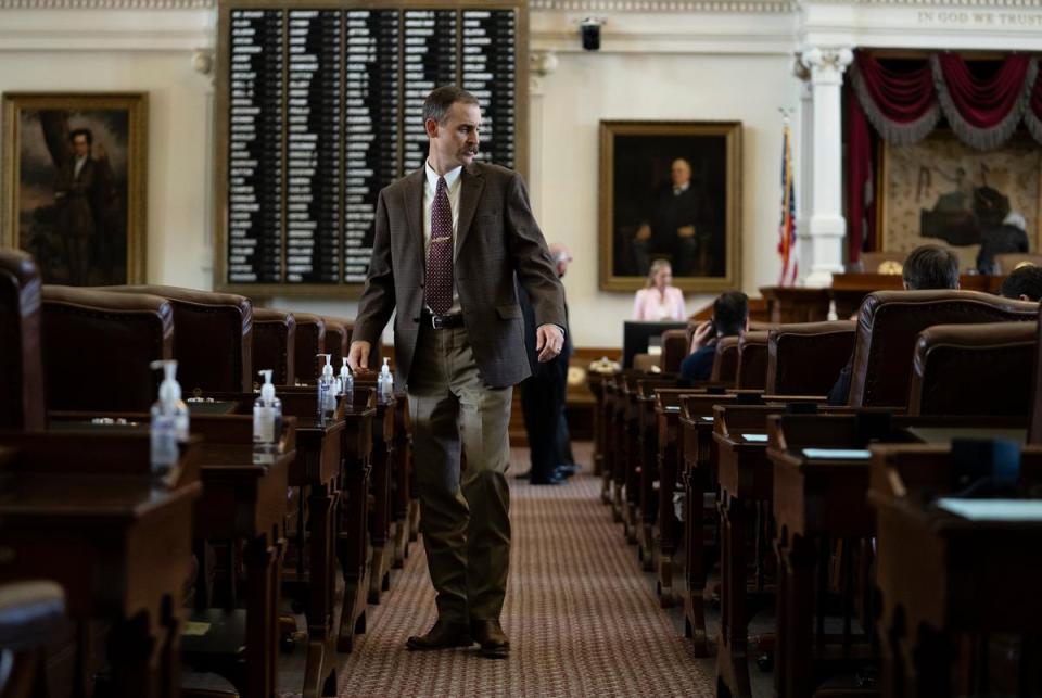 Rep. Andrew S. Murr, R-Junction, walks down an aisle on the House floor on July 20, 2021.