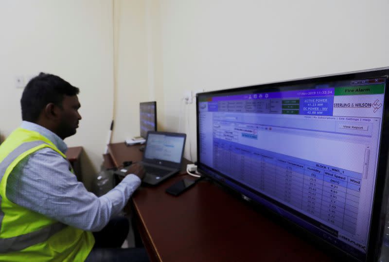 An engineer works in main control centre at the Benban photovoltaic solar plant in the southern Egyptian city of Aswan
