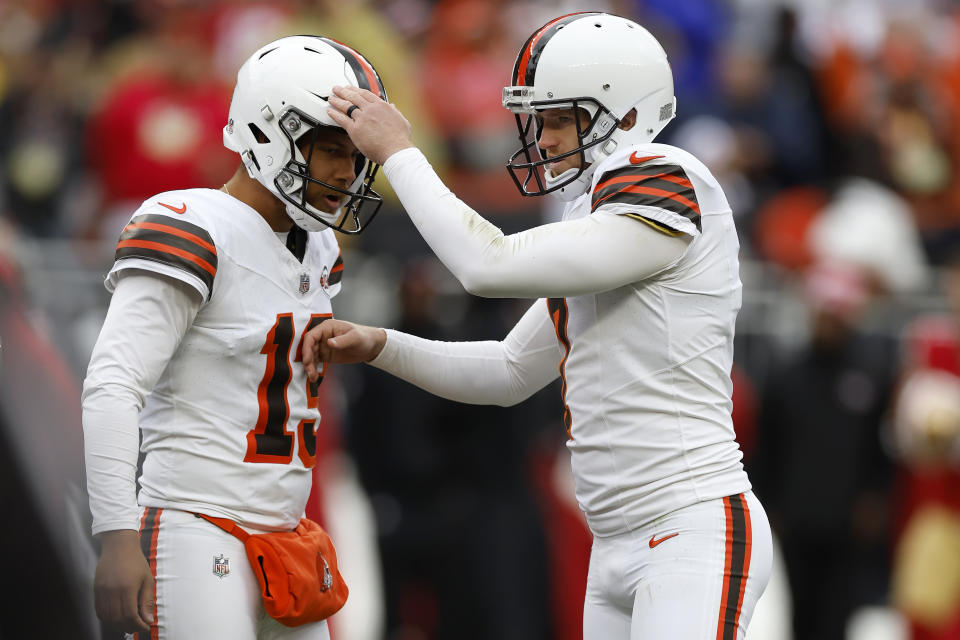 Cleveland Browns place kicker Dustin Hopkins, right, celebrates with Corey Bojorquez after kicking a field goal against the San Francisco 49ers during the second half of an NFL football game Sunday, Oct. 15, 2023, in Cleveland. (AP Photo/Ron Schwane)