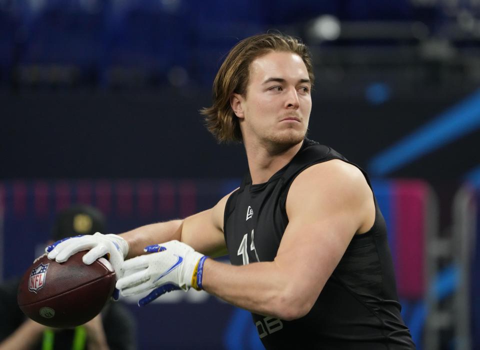 Pittsburgh QB Kenny Pickett goes through drills at the combine.