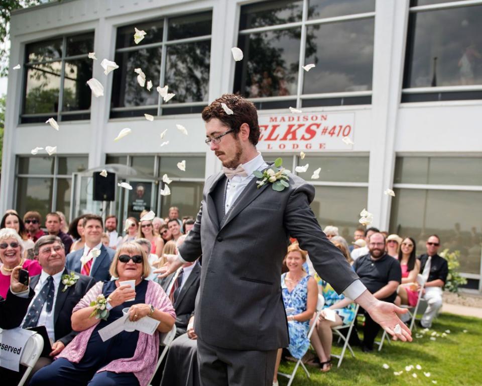 This man served as the flower man in his cousin's wedding. (Credit: Erin Moore Photography)