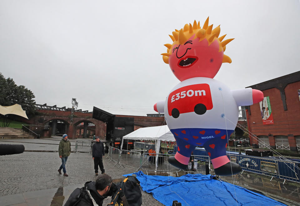 A Boris blimp is inflated at Castlefield Bowl, Manchester as part of the Reject Brexit defend our democracy protest. (Photo by Peter Byrne/PA Images via Getty Images)