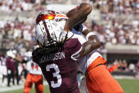 Bowling Green wide receiver Tyrone Broden (0) holds on to a 25-yard touchdown reception pass while Mississippi State cornerback Decamerion Richardson (3) attempts to strip the ball away during the first half of an NCAA college football game in Starkville, Miss., Saturday, Sept. 24, 2022. (AP Photo/Rogelio V. Solis)