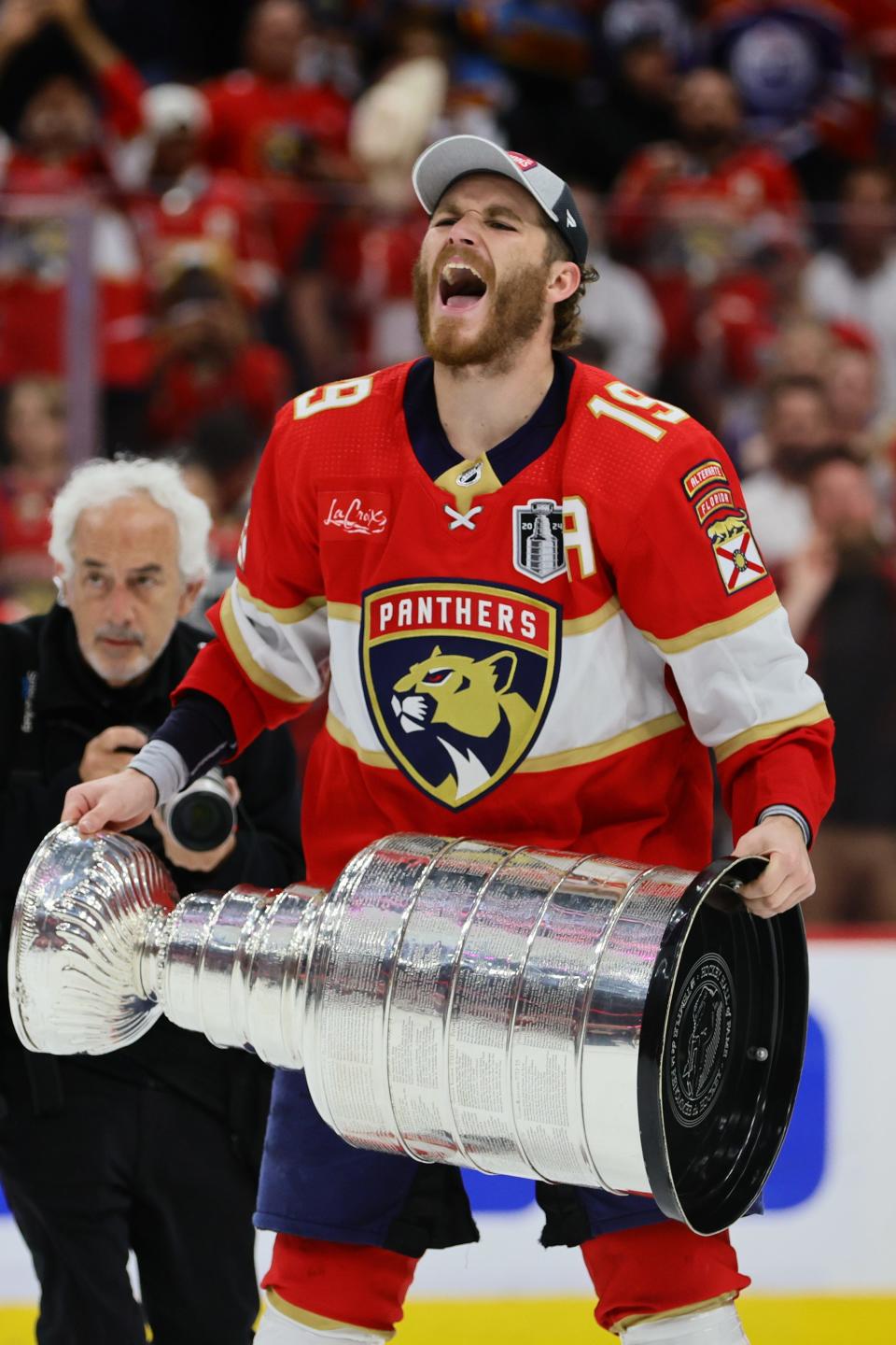 Panthers forward Matthew Tkachuk hoists the real Stanley Cup after defeating the Edmonton Oilers Monday night in Sunrise.