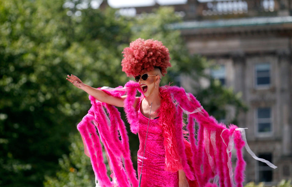 <p>A reveler reacts as the Pride parade makes its way through the city center, in Belfast, Northern Ireland, Saturday Aug. 5, 2017. (Photo: Peter Morrison/PA via AP) </p>