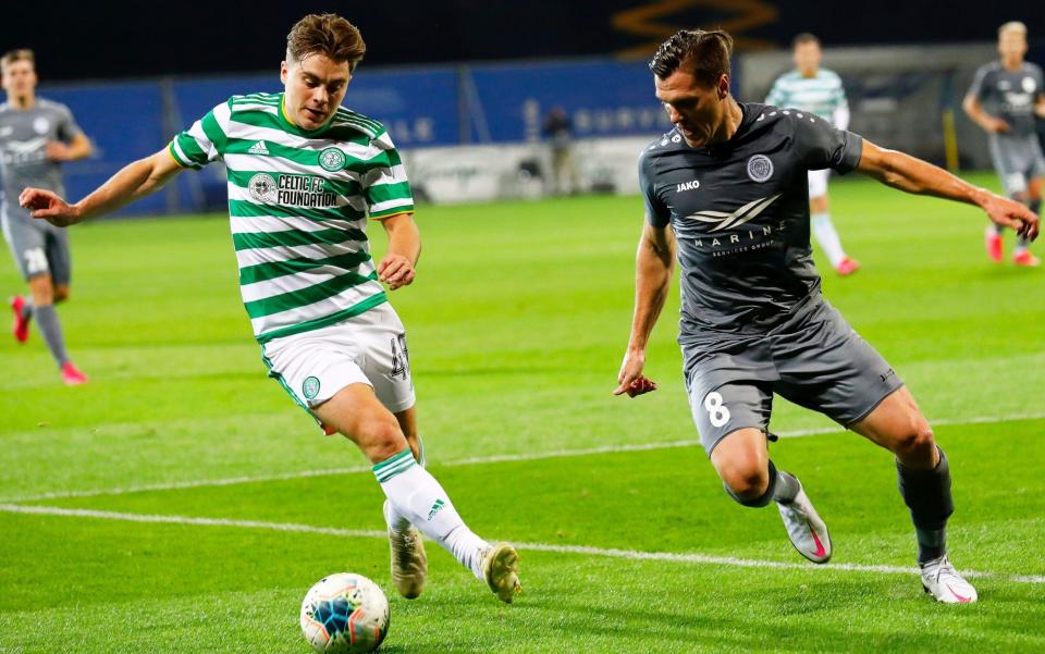 James Forrest (L) of Celtic in action against Ritvars Rugins (R) of Riga during the UEFA Europa League third qualifying round soccer match between FK Riga and Celtic Glasgow at the Daugava stadium in Riga, Latvia, 24 September 2020. - TOMS KALNINS/EPA-EFE/Shutterstock