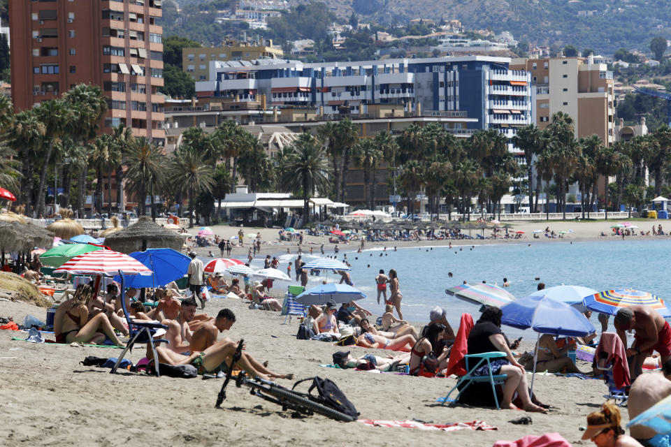 MALAGA, SPAIN -JULY 19 : Sunbathers enjoy along the beach of La Malagueta, on July 19, 2020 in Malaga, Andalucia, Spain. (Photo by Alex Zea/Europa Press via Getty Images)