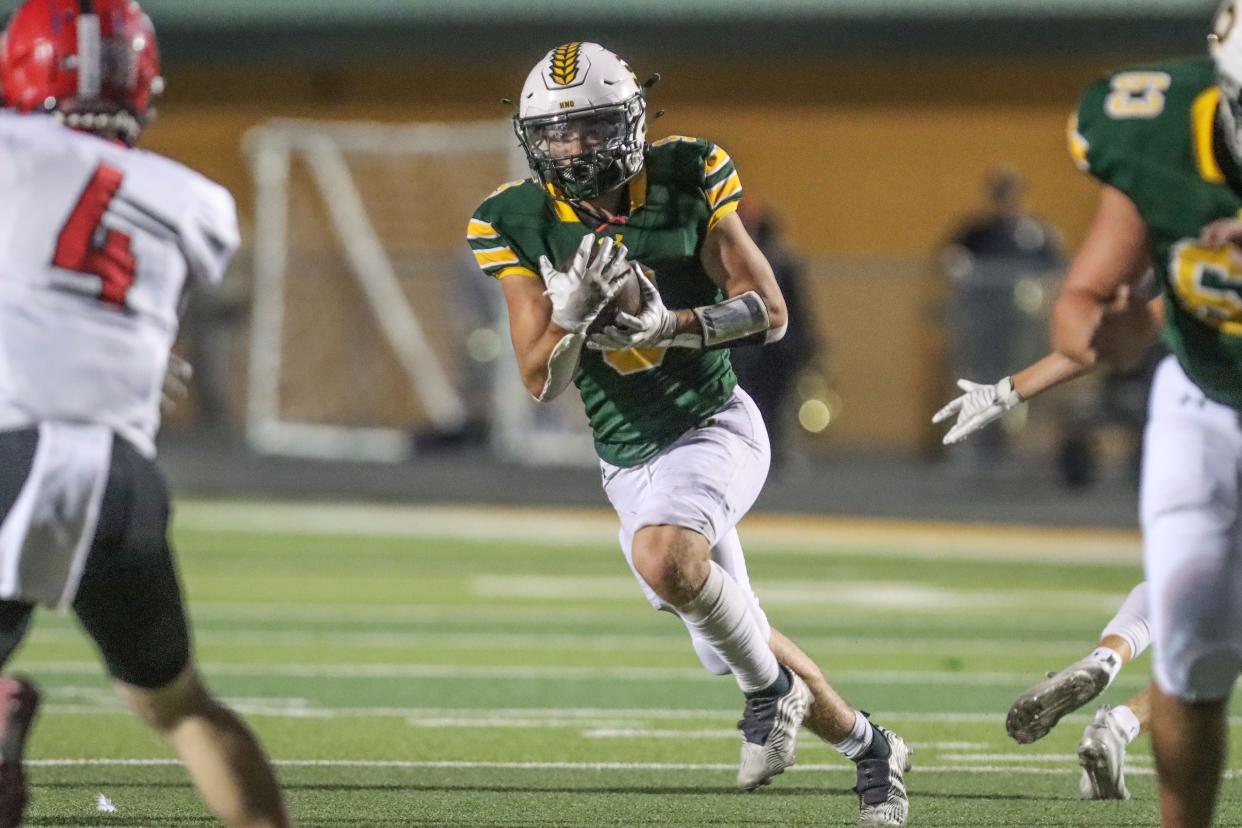 Pampa’s Max Neff (9) runs with the ball against the Borger defense during a nondistrict game Friday, Sept. 30, 2022, at Harvester Stadium in Pampa. Pampa won, 43-40.