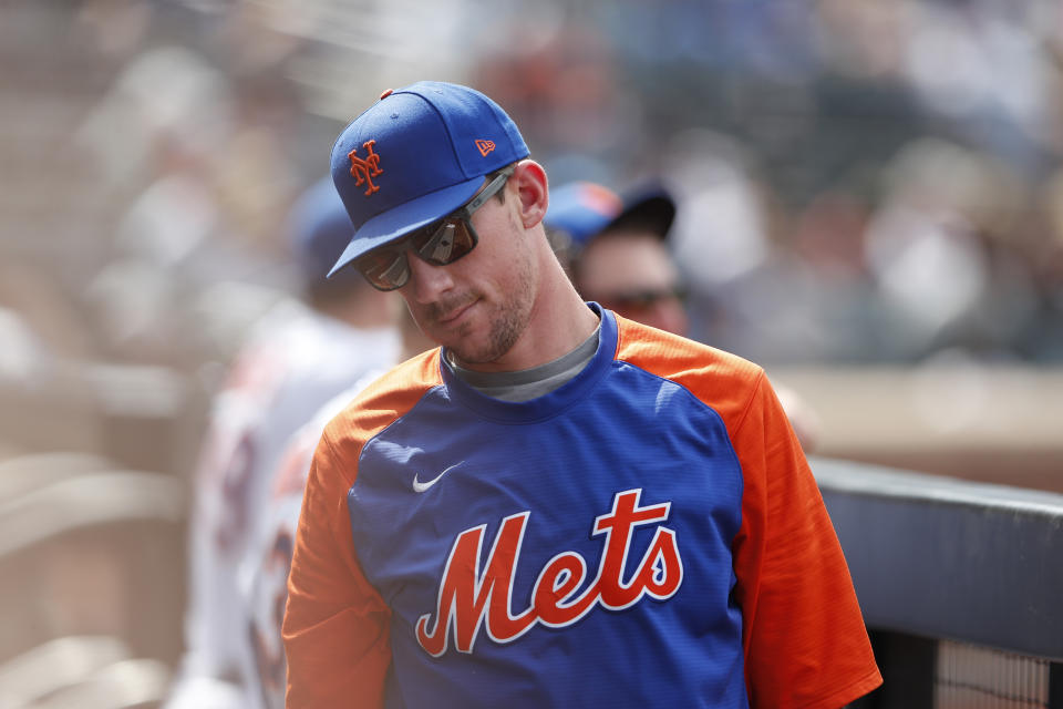 New York Mets starting pitcher Max Scherzer looks on in the dugout during the third inning of a baseball game against the Washington Nationals. Sunday, Sept. 4, 2022, in New York. (AP Photo/Noah K. Murray)