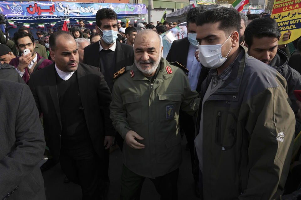 Chief of Iran's Revolutionary Guard Hossein Salami, center, takes part in the annual rally commemorating Iran's 1979 Islamic Revolution, in Tehran, Iran, Saturday, Feb. 11, 2023. Iran on Saturday celebrated the 44th anniversary of the 1979 Islamic Revolution amid nationwide anti-government protests and heightened tensions with the West. (AP Photo/Vahid Salemi)