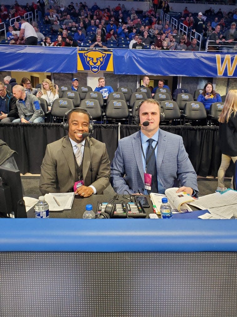 Shawn Kenney, right, is pictured with wrestling analyst Rock Harrison. Kenney and Harrison are ESPN's go-to broadcasting team for ACC wrestling.
