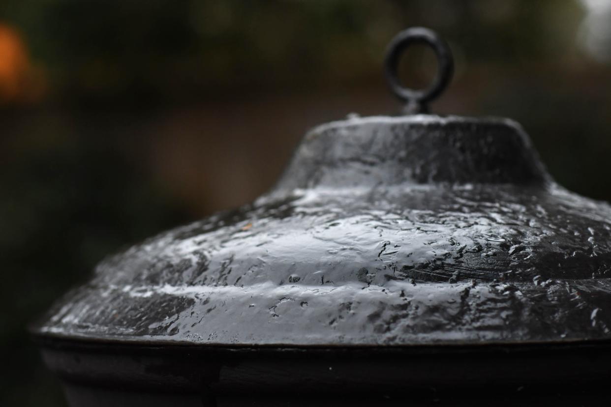 Ice was starting to form on surfaces just before nightfall in Wilmington Friday Jan. 21, 2022. The wintry weather is expected to continue through the night.     [MATT BORN/STARNEWS]