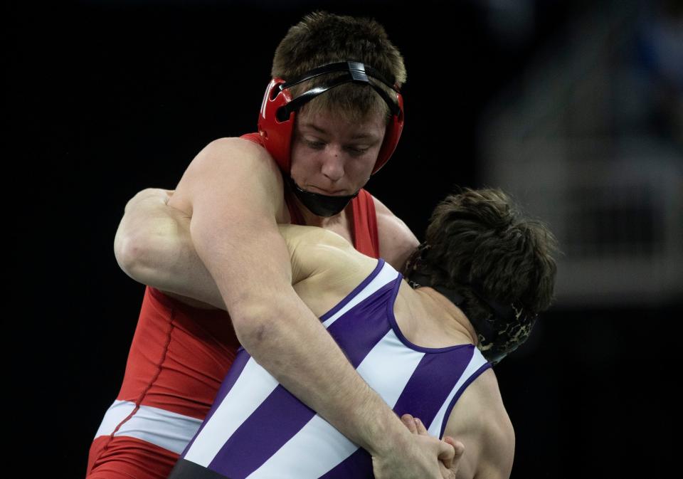 Delaney Ruhlman of Bloomington South wrestles Noah Terry of Tell City in the 170-pound championship match of the 2023 IHSAA Semistate Wrestling tournament at Ford Center in Evansville, Ind., Saturday, Feb. 11, 2023. 