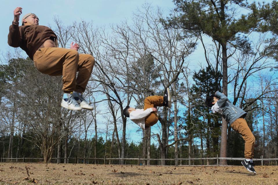 [From left] CJ Boling, Dylan Boling, and Brody Boling pose for a portrait near their house in North Augusta on Wednesday, Dec. 20, 2023.