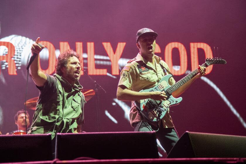 Zack de la Rocha, left, and Tom Morello of Rage Against the Machine perform during the Festival d'été de Québec on Saturday July 16, 2022, in Quebec City. (Photo by Amy Harris/Invision/AP)