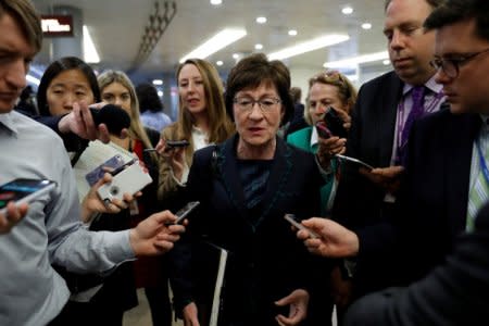 FILE PHOTO: Sen. Susan Collins (R-ME) speaks with reporters ahead of the party luncheons on Capitol Hill in Washington, U.S., October 3, 2017. REUTERS/Aaron P. Bernstein/File Photo