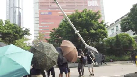 A smart lamppost is pulled and demolished in Kwun Tong in Hong Kong