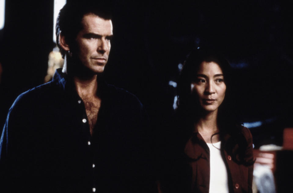 Pierce and Michelle stand side by side in the film