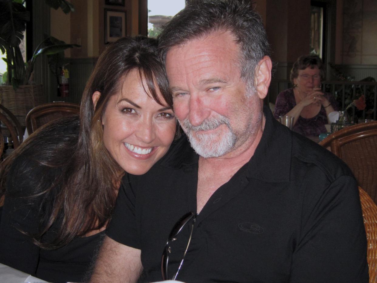 The late comedian Robin Williams and his wife, Susan Schneider Williams, who now works to spread awareness of Lewy body dementia (Vertical Entertainment)