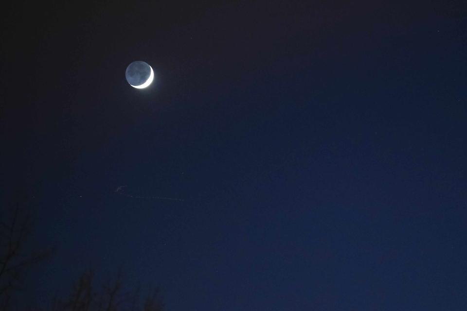 The moon and Jupiter seen in conjunction in December 2020. 