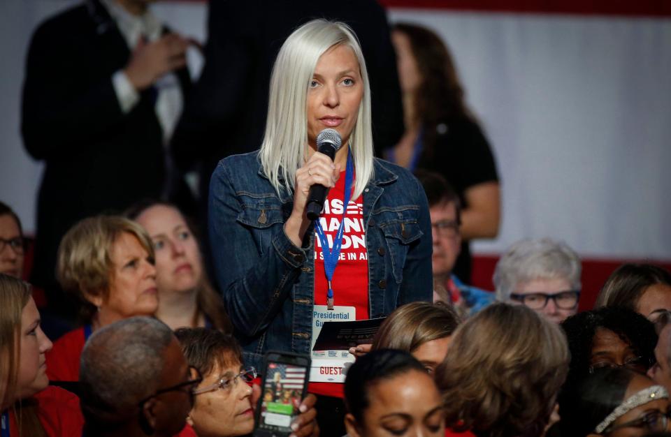 A member of the audience asks a question during the Presidential Gun Sense Forum on Saturday, Aug. 10, 2019, at the Iowa Events Center in Des Moines. 