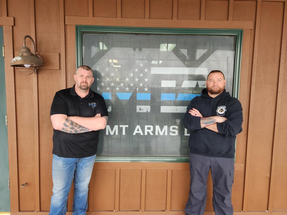 Tim New (left) and Mark Kasterko of MT Arms gun shop in Somerset.