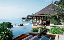 <p>At the <a rel="nofollow noopener" href="http://www.pangkorlautresort.com/" target="_blank" data-ylk="slk:Pangkor Laut Resort;elm:context_link;itc:0;sec:content-canvas" class="link ">Pangkor Laut Resort</a> in Malaysia, guests can choose between hilltop jungle stays or upscale villas over the sea. Stilted Sea Villas are connected by wooden walkways, while the standalone Spa Villas are exceptionally private. </p>