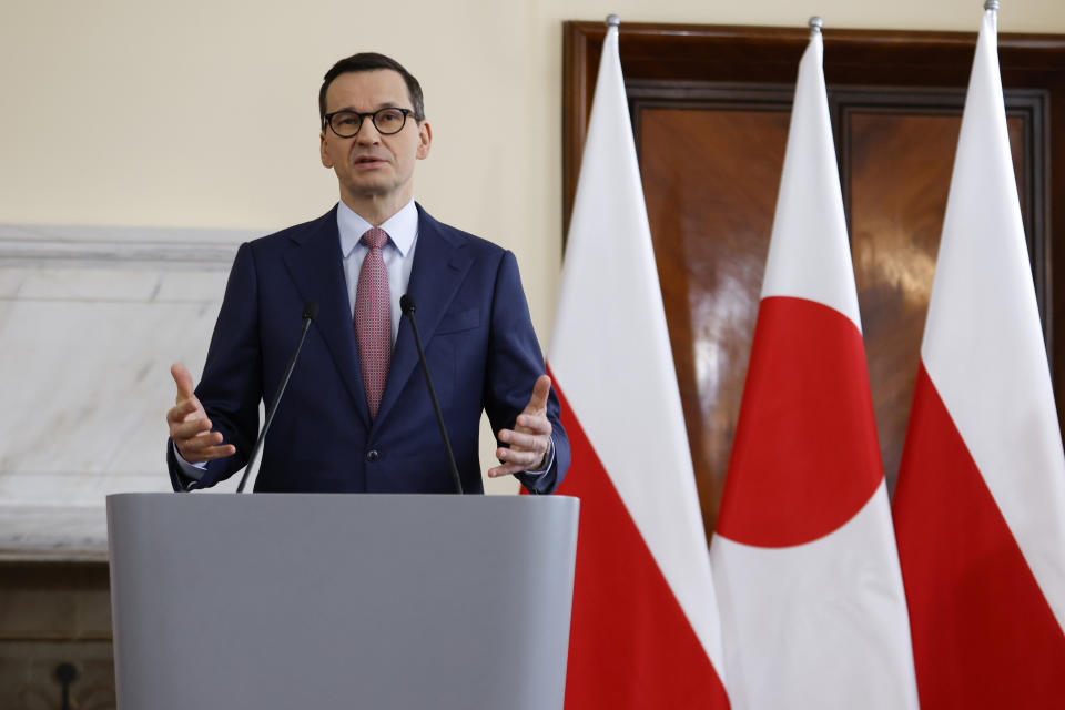 Polish Prime Minister Mateusz Morawiecki address the media at a press conference with Japanese Prime Minister Fumio Kishida in Warsaw, Poland, Wednesday, March 22, 2023. (AP Photo/Michal Dyjuk)