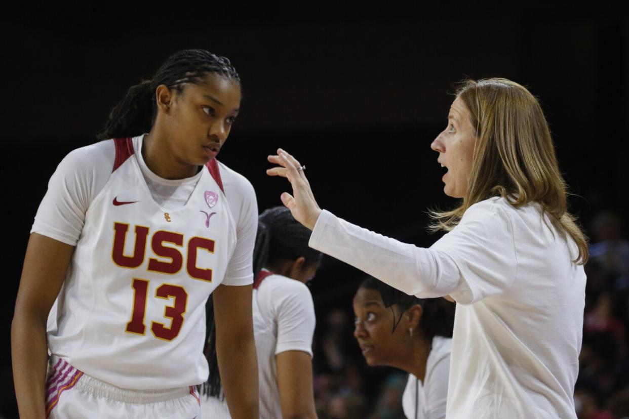 USC women's basketball coach Lindsay Gottlieb speaks with guard Rayah Marshall during a game against Stanford on Feb. 6.